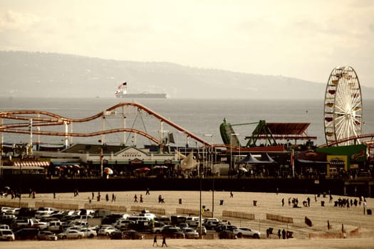 Santa Monica,United States - December 28,2015: Santa Monica Beach and Santa Monica Pier with visitors and tourists on December 28,2015 in Santa Monica.