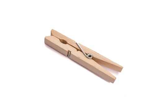 Wooden clothespin with metal spring as cropped