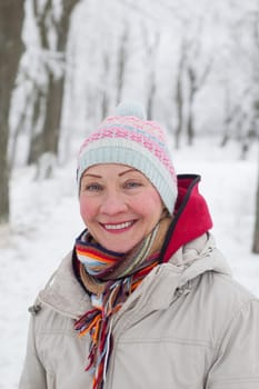 Portrait of a woman in a winter park