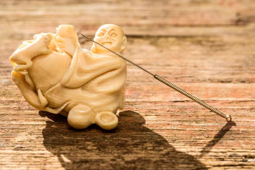Acupuncture needle on Chinese,antique figure