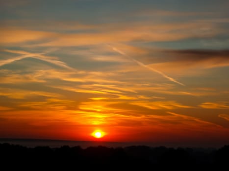 Sunset landscape. Horizon at sunset. Red black paint