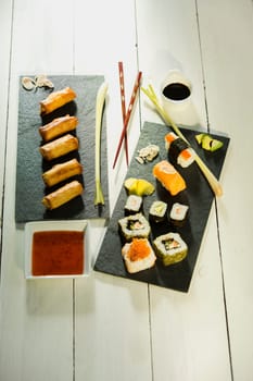 Spring rolls and sushi