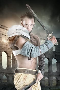 Ancient warrior or Gladiator in the arena with swords