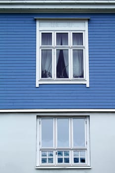 house bottom white wall up blue wooden architecture