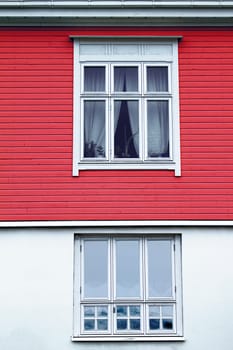 house bottom white wall up red wooden architecture