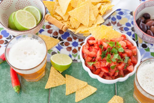 Beer and Tortilla Chips with Tomato Salsa