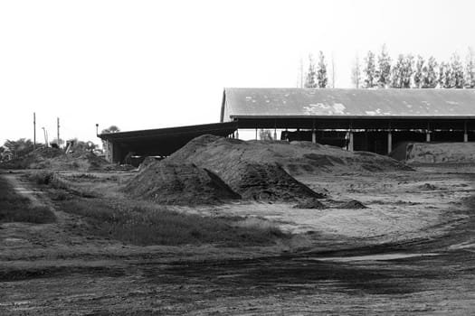 industry excavation mineral soil digging shed black white