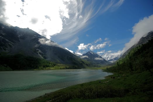 Mountain landscape. Highlands, the mountain peaks, gorges and valleys. The stones on the slopes.