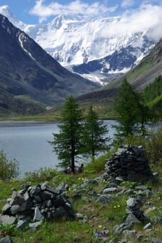 Mountain landscape. Highlands, the mountain peaks, gorges and valleys. The stones on the slopes.