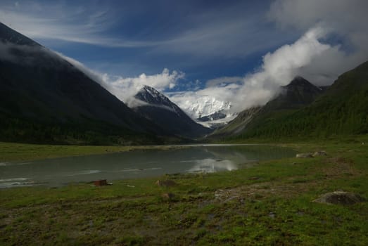 Mountain landscape. Highlands, the mountain peaks, gorges and valleys. The stones on the slopes.