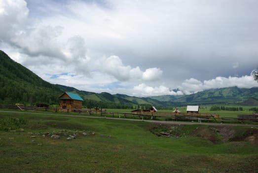 Mountain landscape. Highlands, the mountain peaks, gorges and valleys. The stones on the slopes.