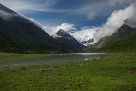 Mountain landscape. Highlands, the mountain peaks, gorges and valleys. The stones on the slopes.