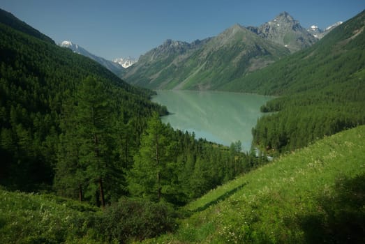 Mountain landscape. Highlands, the mountain peaks, gorges and valleys. The stones on the slopes.