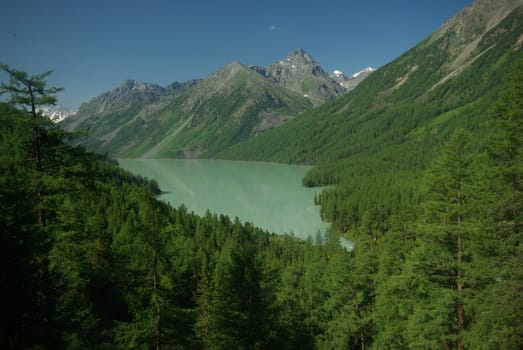 Mountain landscape. Highlands, the mountain peaks, gorges and valleys. The stones on the slopes.