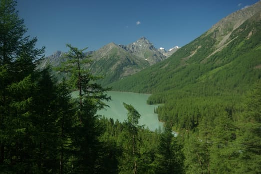 Mountain landscape. Highlands, the mountain peaks, gorges and valleys. The stones on the slopes.