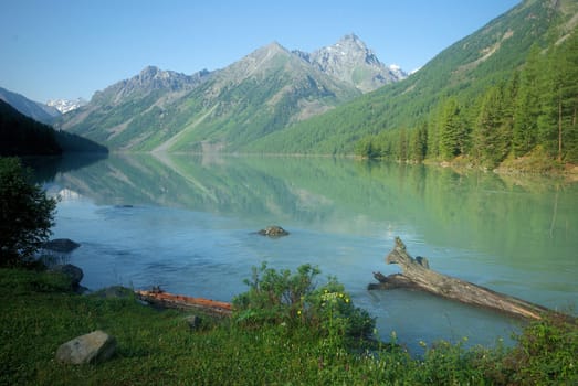 Mountain landscape. Highlands, the mountain peaks, gorges and valleys. The stones on the slopes.