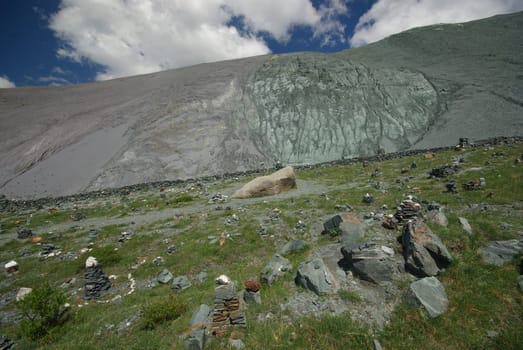 Mountain landscape. Highlands, the mountain peaks, gorges and valleys. The stones on the slopes.