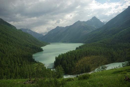Mountain landscape. Highlands, the mountain peaks, gorges and valleys. The stones on the slopes.