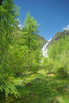 Mountain landscape. Highlands, the mountain peaks, gorges and valleys. The stones on the slopes.