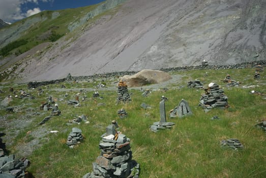 Mountain landscape. Highlands, the mountain peaks, gorges and valleys. The stones on the slopes.