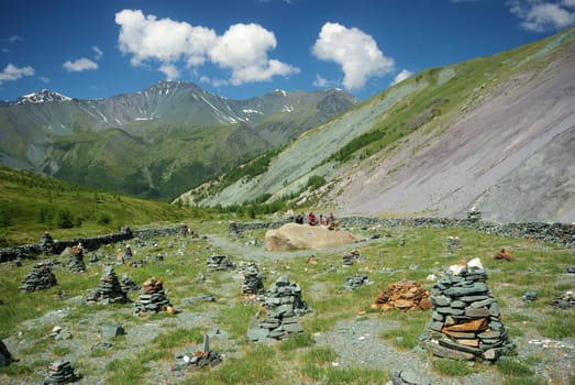 Mountain landscape. Highlands, the mountain peaks, gorges and valleys. The stones on the slopes.