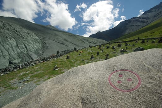 Mountain landscape. Highlands, the mountain peaks, gorges and valleys. The stones on the slopes.