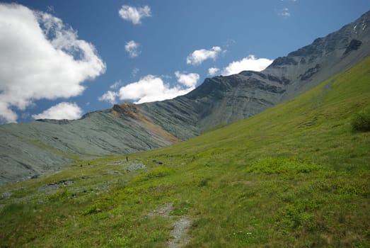Mountain landscape. Highlands, the mountain peaks, gorges and valleys. The stones on the slopes.