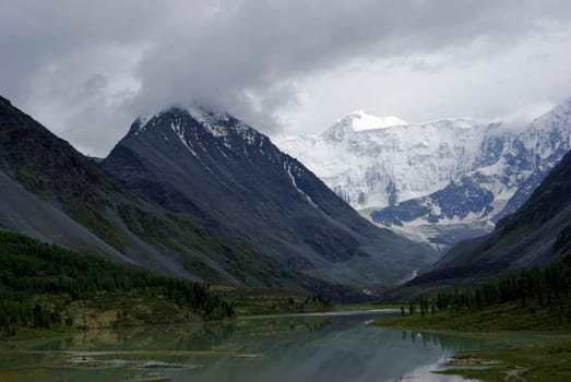 Mountain landscape. Highlands, the mountain peaks, gorges and valleys. The stones on the slopes.