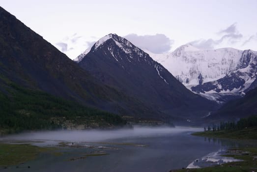 Mountain landscape. Highlands, the mountain peaks, gorges and valleys. The stones on the slopes.