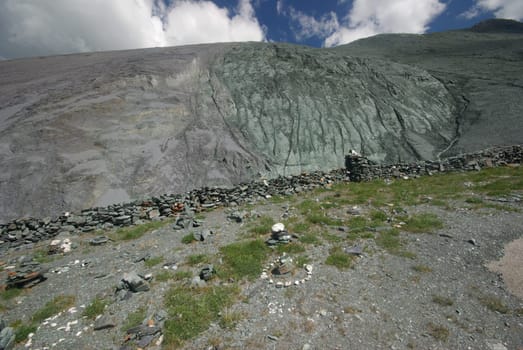 Mountain landscape. Highlands, the mountain peaks, gorges and valleys. The stones on the slopes.