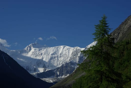 Mountain landscape. Highlands, the mountain peaks, gorges and valleys. The stones on the slopes.