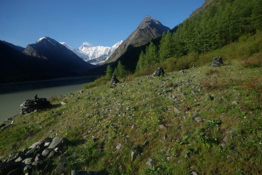 Mountain landscape. Highlands, the mountain peaks, gorges and valleys. The stones on the slopes.