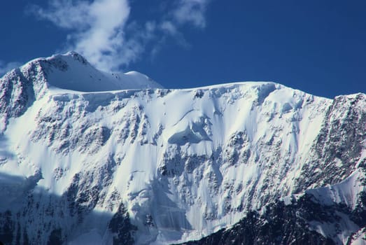 Mountain landscape. Highlands, the mountain peaks, gorges and valleys. The stones on the slopes.
