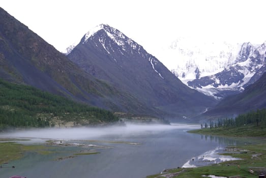 Mountain landscape. Highlands, the mountain peaks, gorges and valleys. The stones on the slopes.