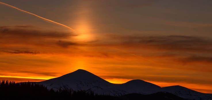 Majestic sunset in the Karpathian mountains landscape with Dramatic sky.  beautiful background