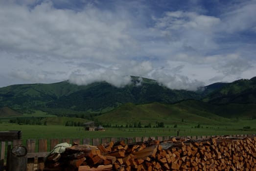 Mountain landscape. Highlands, the mountain peaks, gorges and valleys. The stones on the slopes.