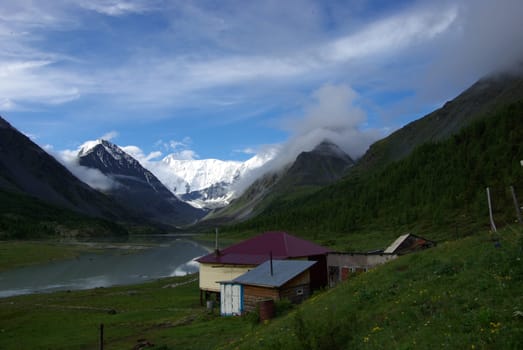 Mountain landscape. Highlands, the mountain peaks, gorges and valleys. The stones on the slopes.