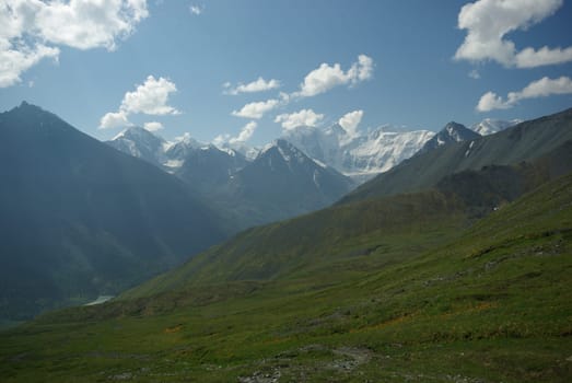 Mountain landscape. Highlands, the mountain peaks, gorges and valleys. The stones on the slopes.