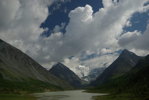 Mountain landscape. Highlands, the mountain peaks, gorges and valleys. The stones on the slopes.