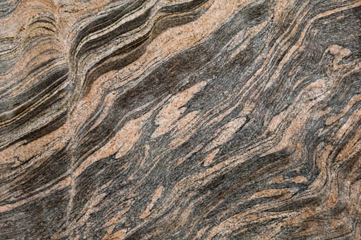 Polished magmatic or metamorphic rock cross section as background