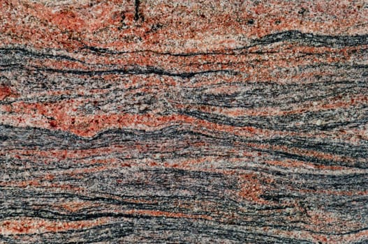 Polished magmatic or metamorphic rock cross section as background