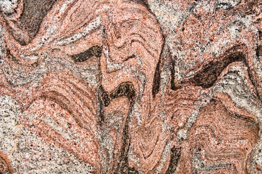 Polished magmatic or metamorphic rock cross section as background