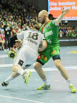 Niclas Ekberg (THW Kiel left) and Yves Grafenhorst (SC Magdeburg right) during the DKB Handball Bundesliga match 2016-2017,SC Magdeburg against THW Kiel