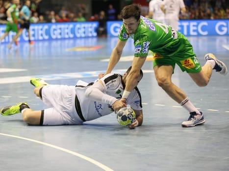 Vladimir Vranjes (Tatabanya -left) and Nemanja Zelenovic (SC Magdeburg -re. in the EHF Cup match SC Magdeburg-Tatabanya KC on 19.2.17 in Magdeburg