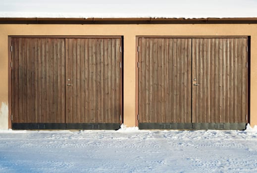 Pair of Garage Doors with snow.