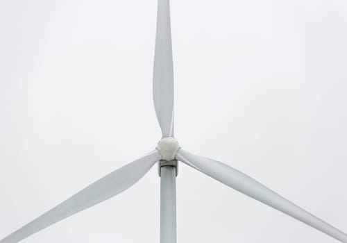 Wind Power Station Close Up with a gray background.