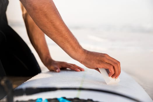 A surfer getting ready for the surf