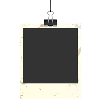 old empty dirty photo with binder clip hanging at black twine
