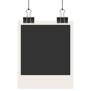 old empty photo with binder clips hanging at black twine
