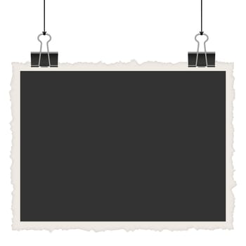old empty photo with binder clips hanging at black twine